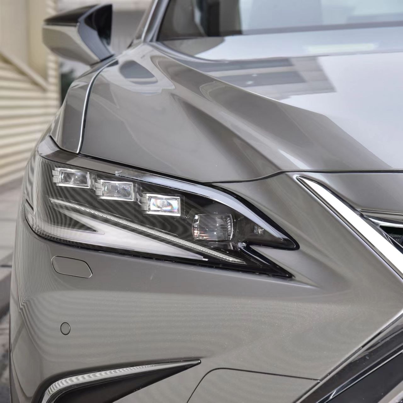 Lexus ES triple-eye LED headlight view 2