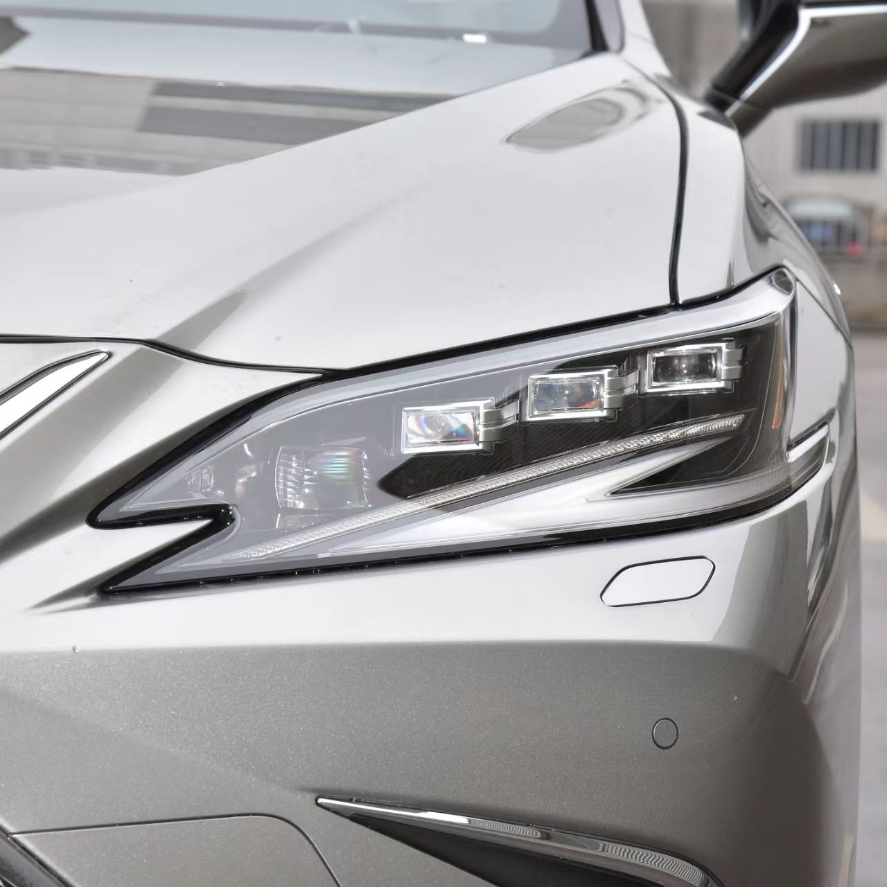 Lexus ES triple-eye LED headlight view 3